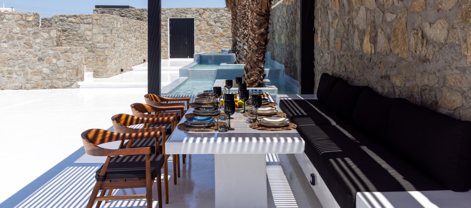 Exterior dining area of Villa Calthea in Mykonos