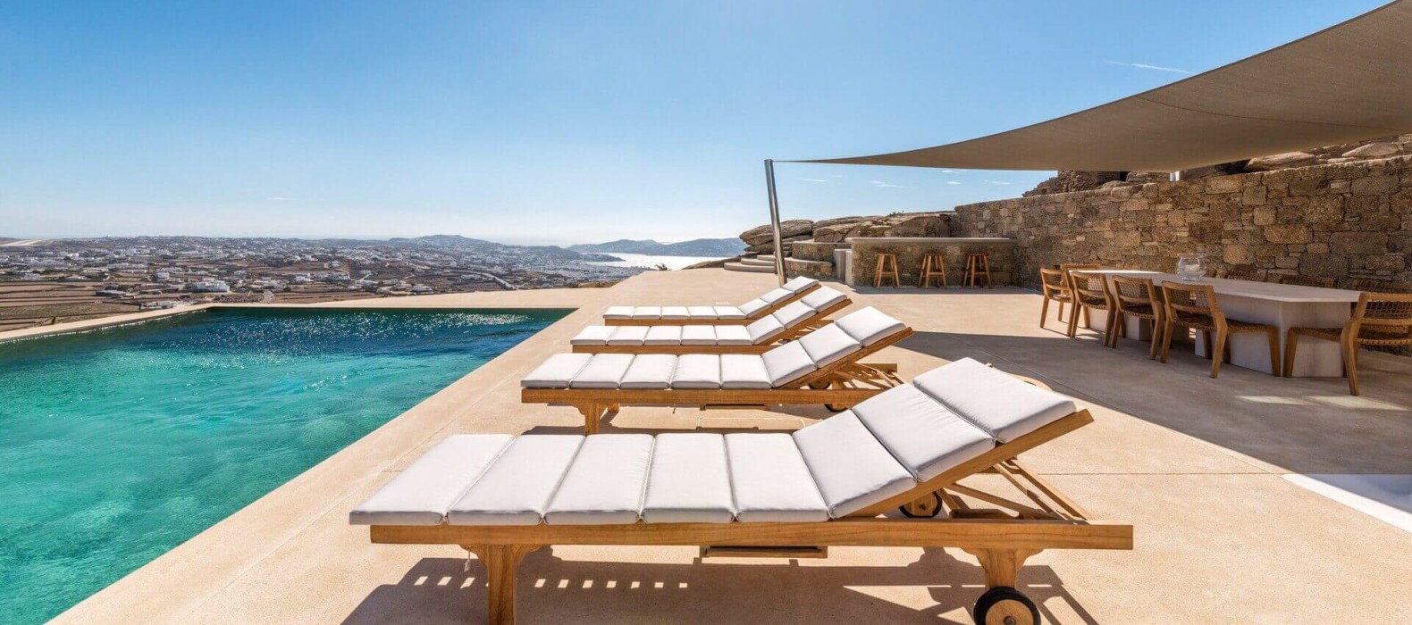 Sun loungers of Villa Celestial Theresa in Mykonos