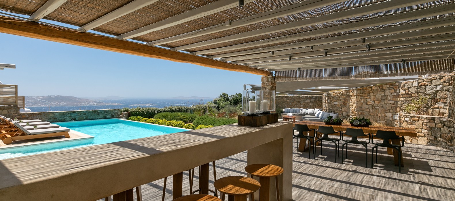Exterior dining and bar area of Villa Christina Grande, Mykonos
