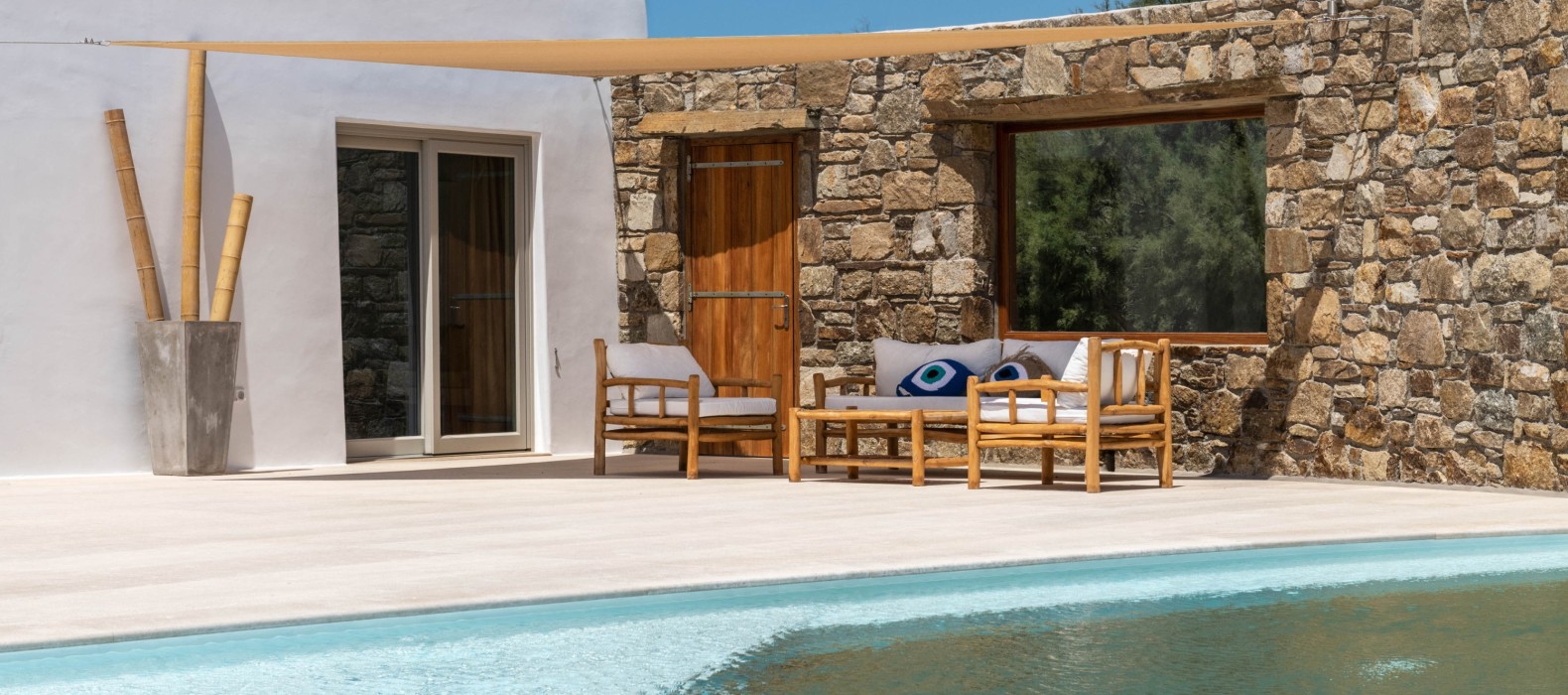Exterior chill area next to the pool of Villa Eratos in Mykonos