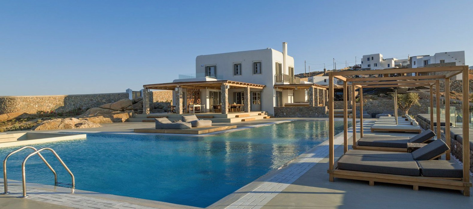 Exterior pool with sun loungers of Villa Galia in Mykonos