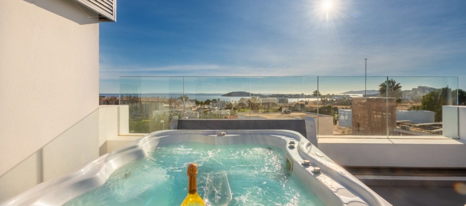 Exterior whirlpool with sea view of Casa Oleta in Ibiza