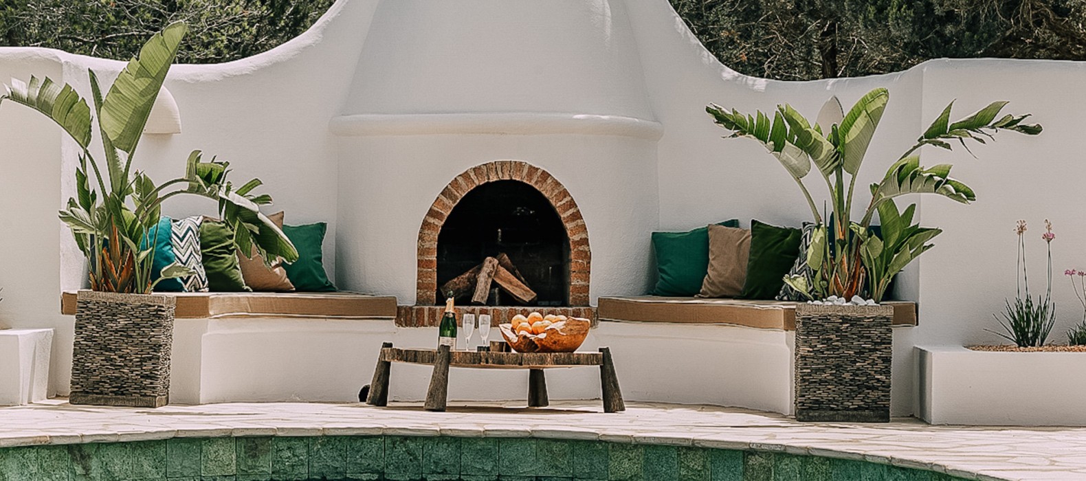 Lounge area with fire place of Villa La Colina in Ibiza