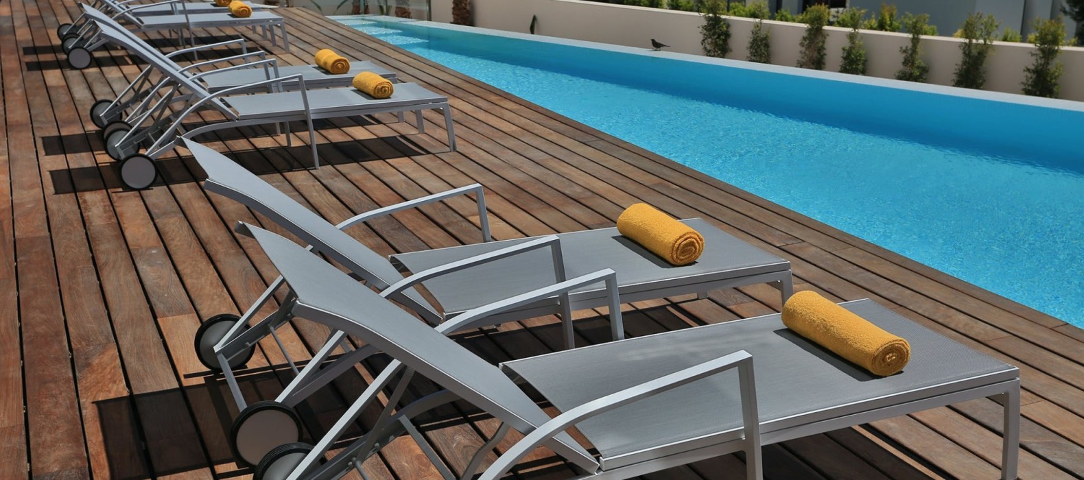 Sun lounger at the pool of Villa Amaya in Ibiza