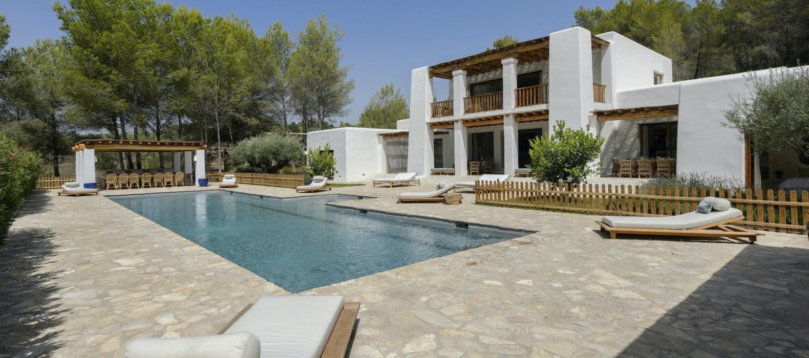 Garden with pool and sun lounger of Villa Blissful Life in Ibiza