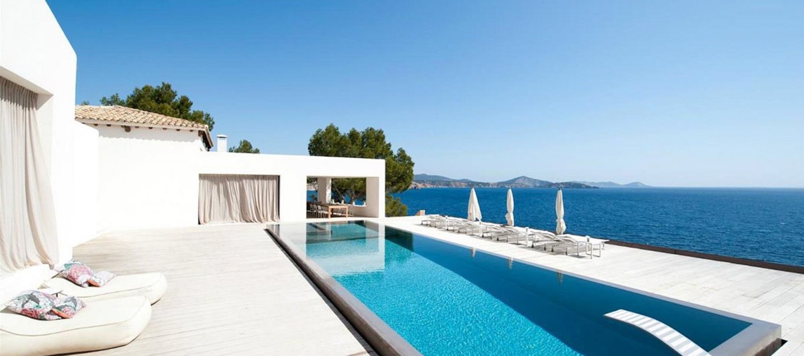 Exterior area with long pool of Villa Cocoa Paradise in Ibiza