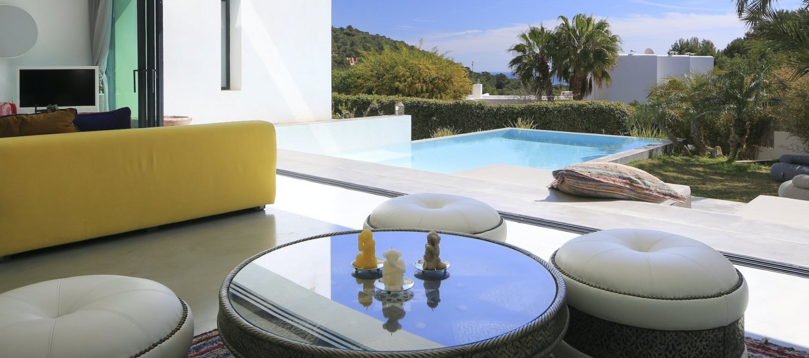 Living room with pool view of Villa Love and Light in Ibiza