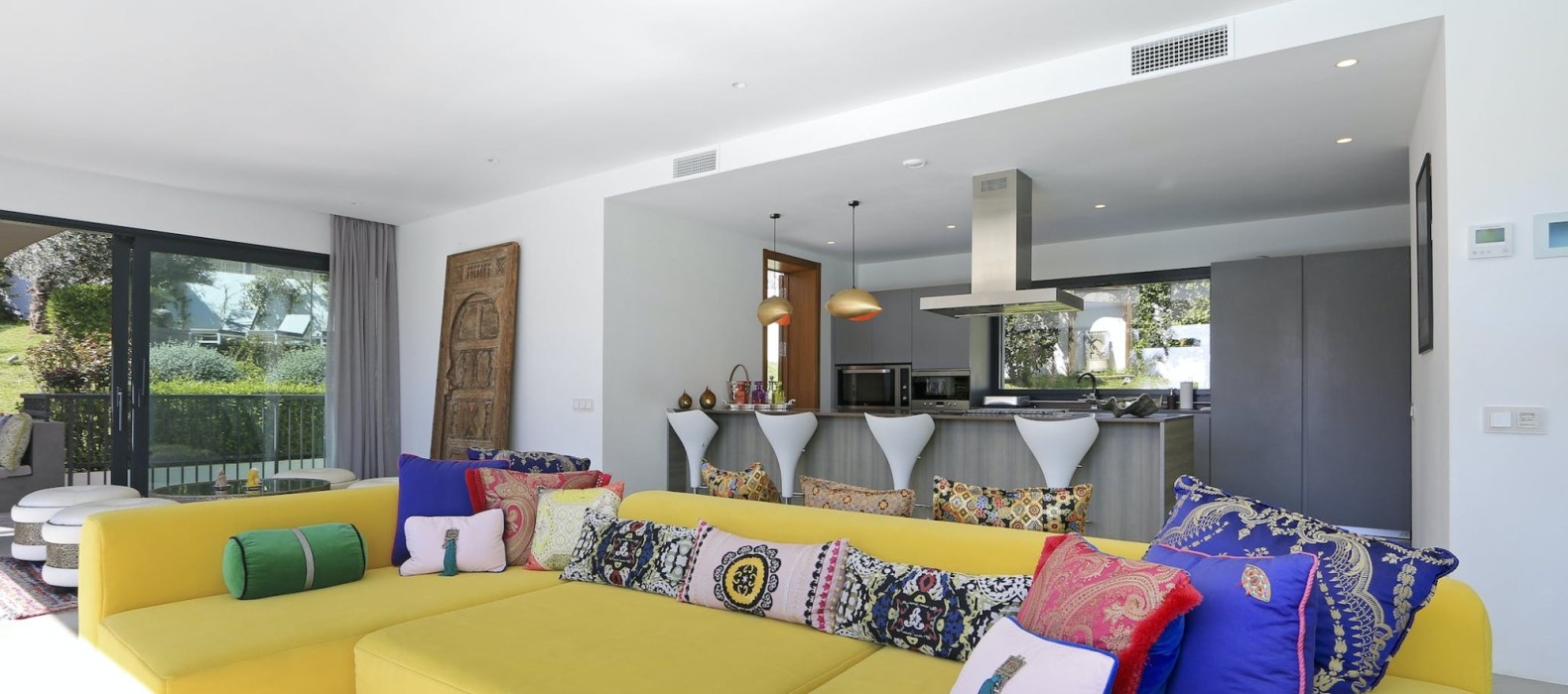 Living room and open kitchen of Villa Love and Light in Ibiza