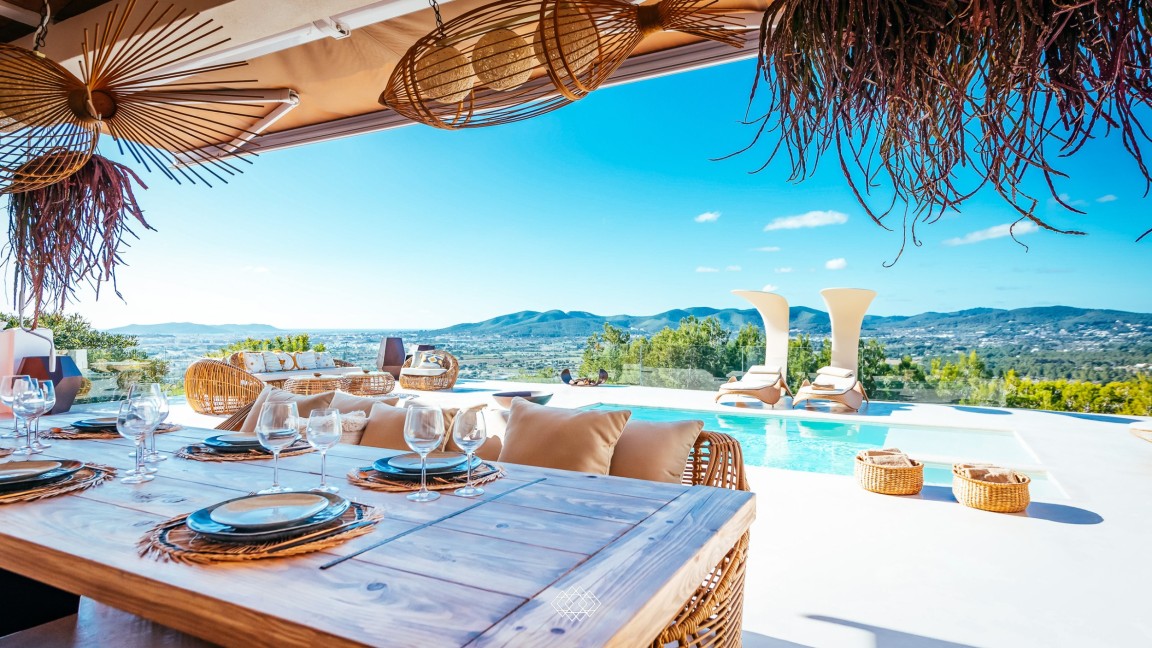 Exterior dining area with panorama view of Villa The Nest Two in Ibiza