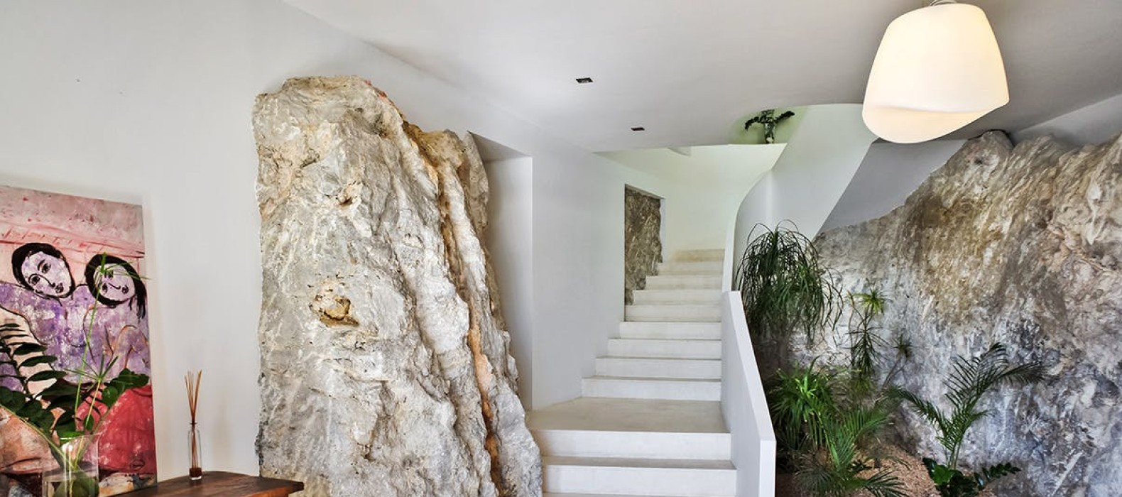 Stairs and hall waz with nature stone of Casa Savant in Ibiza