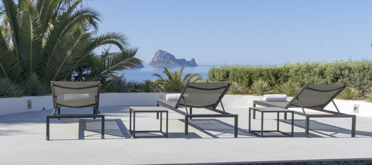Sun loungers with Es Vedra view of Villa The View of Vedra in Ibiza