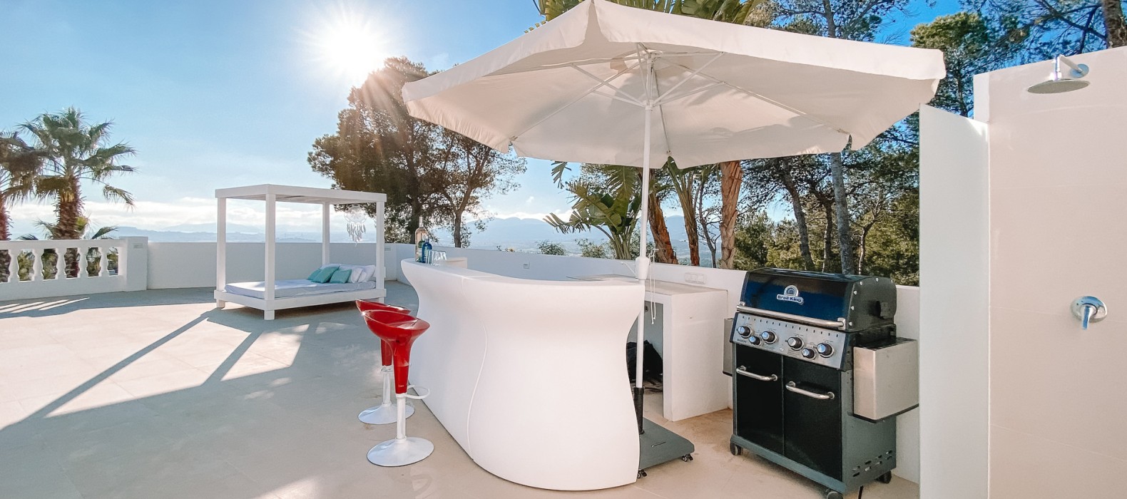 Exterior bar and bbq area of Villa The White Pearl in Ibiza