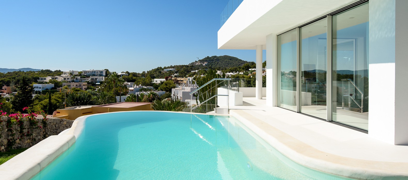 Pool and villa exterior view of Villa Triple X in Ibiza