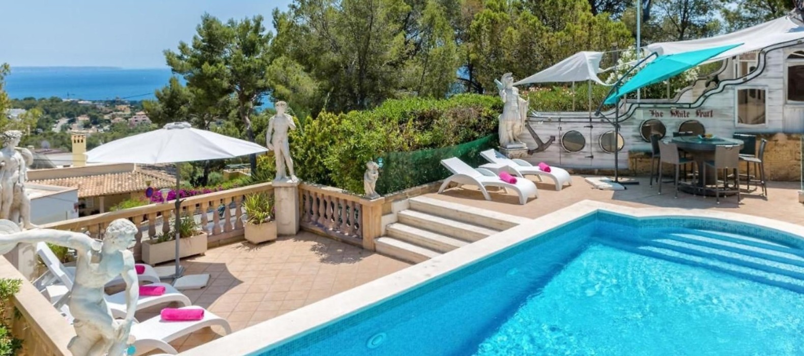 Exterior pool area with sea view of Villa White Ginger in Mallorca